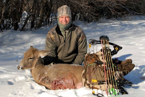 Deep snow and severe cold (air temp minus 19 degrees Fahrenheit; wind-chill minus 47 degrees) helped the author tag this late-December South Dakota doe during a morning bowhunt near a river-bottom bedding area.