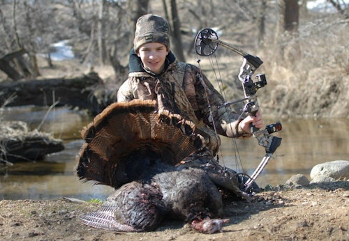 You don’t need to shoot a heavy-draw bow to kill a turkey with a Magnus Bullhead. The author’s son took this jake with a well-placed head shot from a Mission Craze compound drawing only 35 pounds.