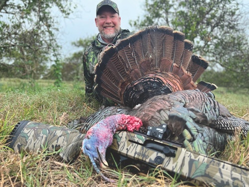 The author took this bonus Osceola tom turkey during his Florida gator hunt.