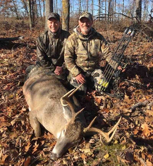 The author (left) celebrates a good friend’s Wisconsin buck. The hunter was patient, passing up broadside shots at about 40 yards, and finally made a perfect double-lung hit at a range of 12 yards.