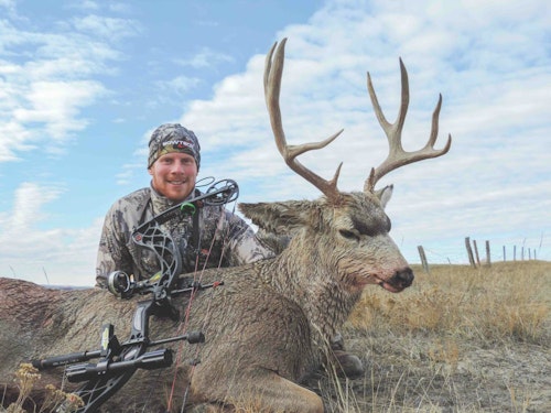 The author made a solid hit on this mule deer, although it was bedded at a tough downhill angle. A stiff crosswind further complicated the shot, but the use of the tips discussed yielded a beautiful muley buck.
