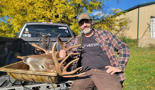 Dan Infalt, aka The Hunting Beast, with a massive buck killed on Wisconsin public land in 2023.