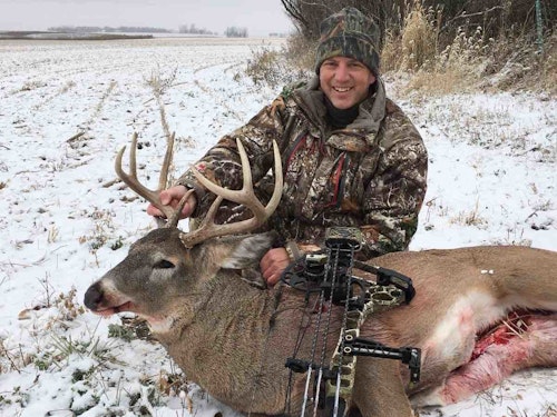 The author killed this late-season buck as it was heading to an alfalfa field. The corn in the area had been cut, which you can see in the background of this photo. Cut cornfields provide zero food for late-season whitetails.