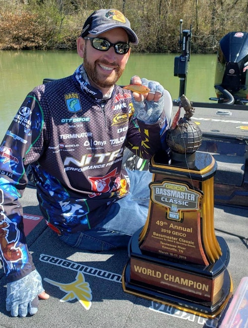 2019 Bassmaster Classic Champion Ott DeFoe showing off his trophy, as well as the Storm Arashi Vibe lipless crankbait. Of the five bass DeFoe brought to the scale on championship Sunday, four were caught on the Z-Man Jack Hammer, one was taken on the Storm Vibe. 