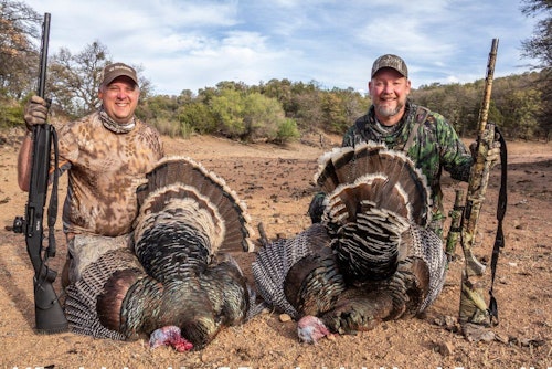 Eric Poole (left) and the author get one step closer to completing their Royal Slams with an unexpected day one double. Eric used a prototype Mossberg 940 Pro Field shotgun, while the author carried the popular Mossberg 935 Magnum. Below, the author and his guide, Joe Williams.
