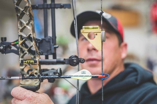 A key in setting up a bow is to make sure the string loop is tied level with the arrow rest. It’s also important to have the peep sight aligned correctly so you can immediately view your sight pins at full draw (below).
