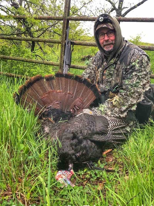 Feeling cold on the outside, but warm on the inside, the author shot his second Missouri tom on a morning better suited for duck hunting.