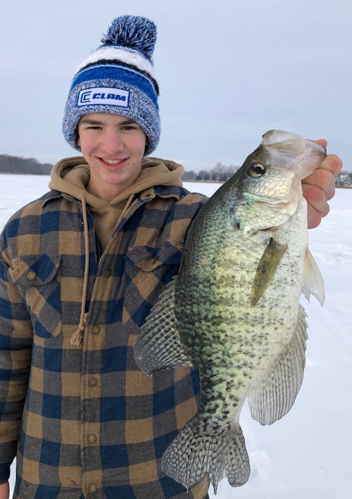 The author’s son caught this 17-inch white crappie on a pink-and-white (Pink Tiger) UV Forage Minnow Spoon tipped with a white/red flake Maxi Plastic Mino. 