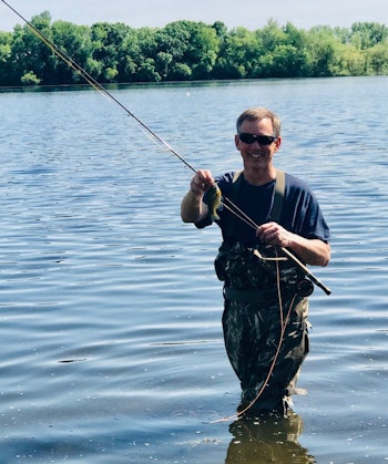 If you don’t want to mess with live bait, you can still catch aggressive spawning sunfish on artificials. Here, the author chose a fly rod instead of spinning tackle for a change of pace. 