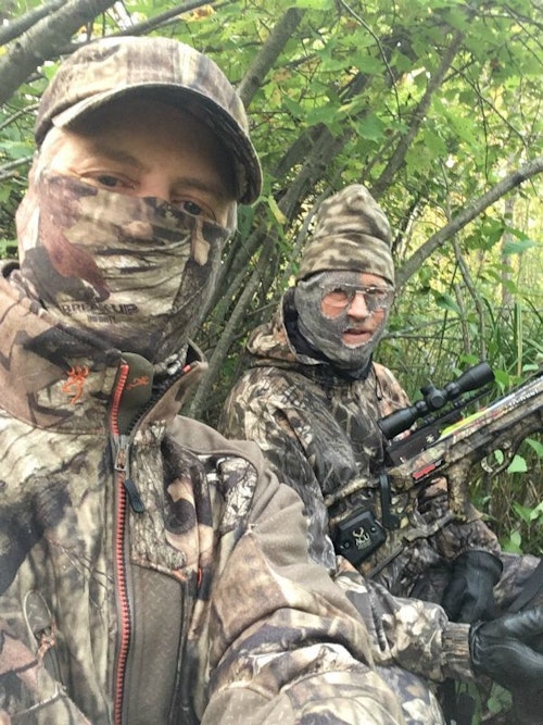 The author (left) and his 82-year-old father during a recent on-the-ground crossbow hunt in Wisconsin. To help avoid the keen eyes of whitetails, the pair wore face coverings.