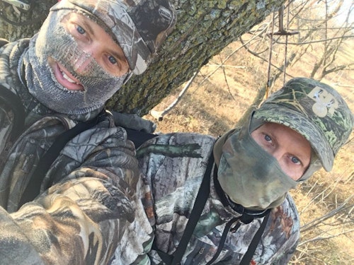 The author (left) and hunting partner Bill waiting on a South Dakota whitetail in a two-person ladder.
