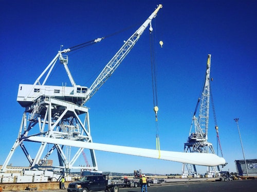 Think of a longshoreman as a shipping and receiving clerk on steroids. Here, Jordan lifts a wind mill blade that measures 208 feet long and weighs 30,000 pounds.