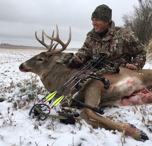 Instead of taking after-dark photos of his South Dakota buck, the author waited until the following morning. By then, a light snow covered the landscape.