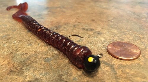 The author’s go-to jigworm combo isn’t expensive, but it’s crazy good on weedline summertime largemouths. Shown here is a plain 1/8-ounce round jig head paired with a 7-inch Berkley PowerBait Powerworm in pumpkinseed color.