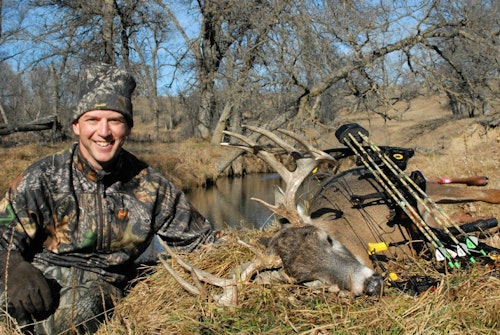 Whitetail Journal Senior Editor Dave Maas lured this mature South Dakota buck into shooting range of his natural ground blind with a Flambeau Flocked Boss Babe decoy (below) that was sprinkled with doe-in-heat scent.