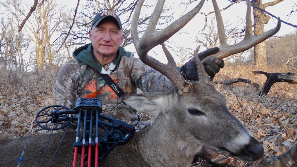 After spending several fruitless days chasing Kansas whitetails in abnormally warm December temperatures, the author finally closed the deal on this Kansas 8-pointer.