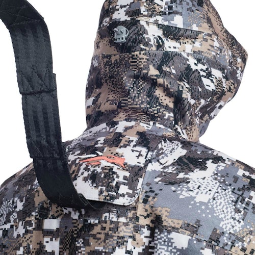 Sitka Gear has a feature on many of its whitetail jackets and parkas called a Safety Harness Pass-Through Port. It allows hunters to wear their safety harness under their outermost jacket.