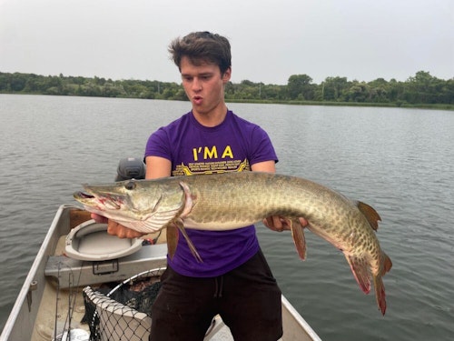 Sam with his first muskie, which measured 38.75 inches.