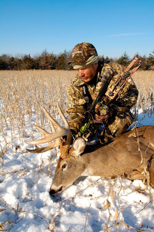 During rifle season, the author took this mature midwestern buck with his bow. Photo: Clint Stone