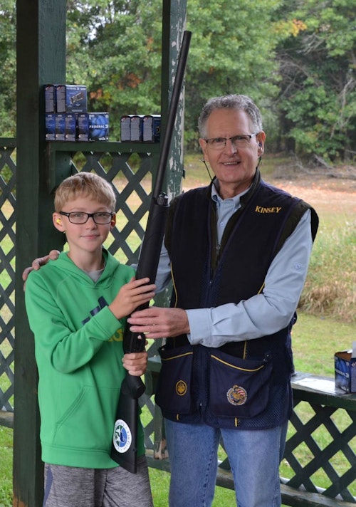 Roofers International President Kinsey Robinson offered young shooters advice on the finer points of form and firearms handling.
