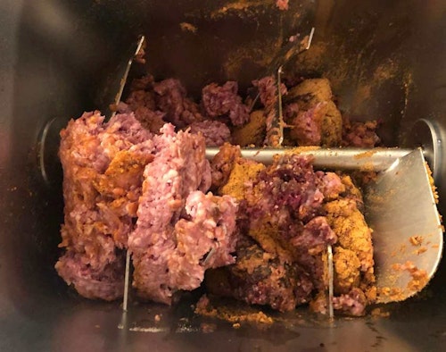 To make 12 pounds of brats, thoroughly mix 2.5 pounds of venison, 9.5 pounds of ground pork and seasonings with 6 ounces of water. Add more water if needed to obtain the right consistency.