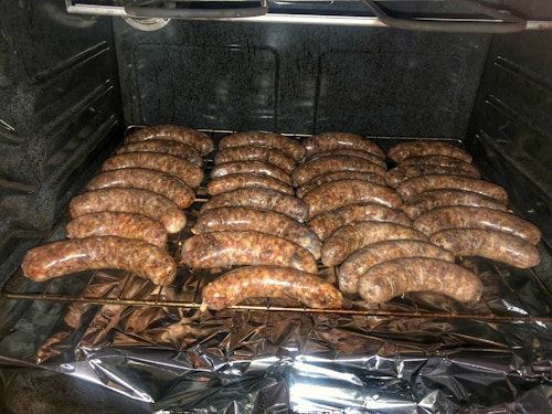 Slow cook the brats in the oven at 180 to 200F until the product reaches an internal temperature of 156F.