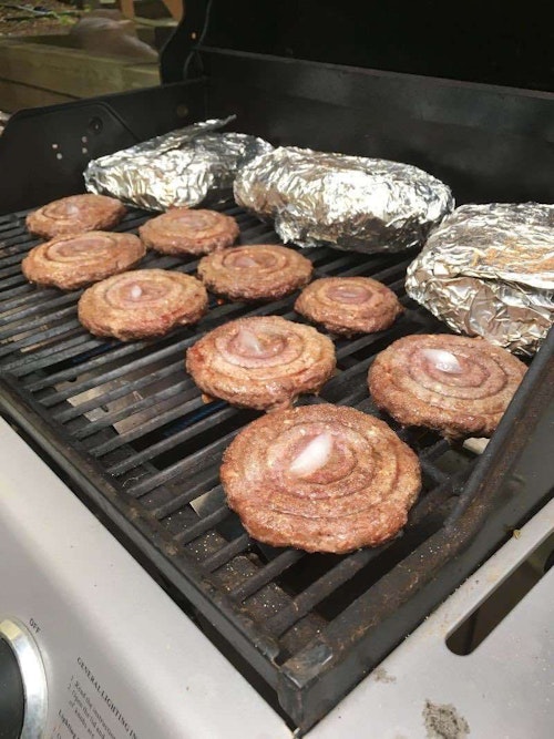One of the author’s favorite foods is elk burgers. Grilling tip: Place a small ice cube in the center of the patty to help keep the meat moist as it cooks.