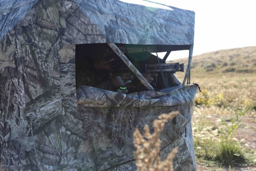 A ground blind keeps a bowhunter hidden, and it also helps contain human odor.
