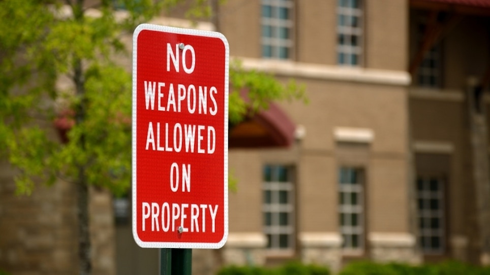 Gun Advocates Take Aim At Signs Prohibiting Gun Possession