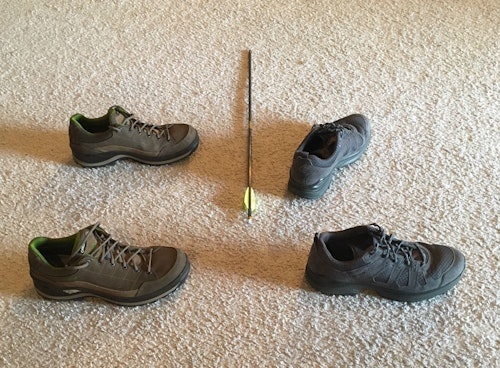 The shoes to the left are aligned sideways to the target; this is often called a square stance. The shoes to the right demonstrate an open bowhunting shooting stance.