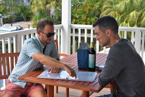 Mike Kaleta (left), co-owner of Once Upon a Beach, showing the author some top fishing spots around Anna Maria Island.