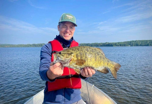 The author with a Master Angler smallmouth bass.