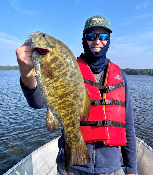 Using small- to medium-sized lures for pike and muskies can often mean bonus fish in the boat, such as this big smallmouth bass.