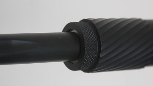One attachment method is by screwing the suppressor directly onto the threaded end of a firearm's barrel. It's a very secure and reliable method. Photo: Silent Legion