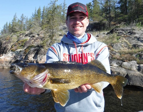 The author with a 25-inch walleye caught on a plastic worm. Too big for shore lunch, this fish was immediately released.