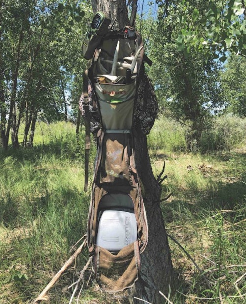 Well before opening day of deer season, take the time to get organized in the tree. Hang your favorite treestand pack and then practice storing and grabbing your rangefinder, deer calls and other gear.